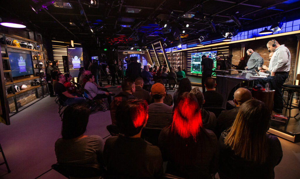 EA’s Studio 209 houses dueling player pods for competitions, a four-person caster desk, media/audience seating, and more